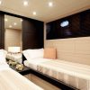 Motor yacht KAWAI twin stateroom with two single beds with low lighting